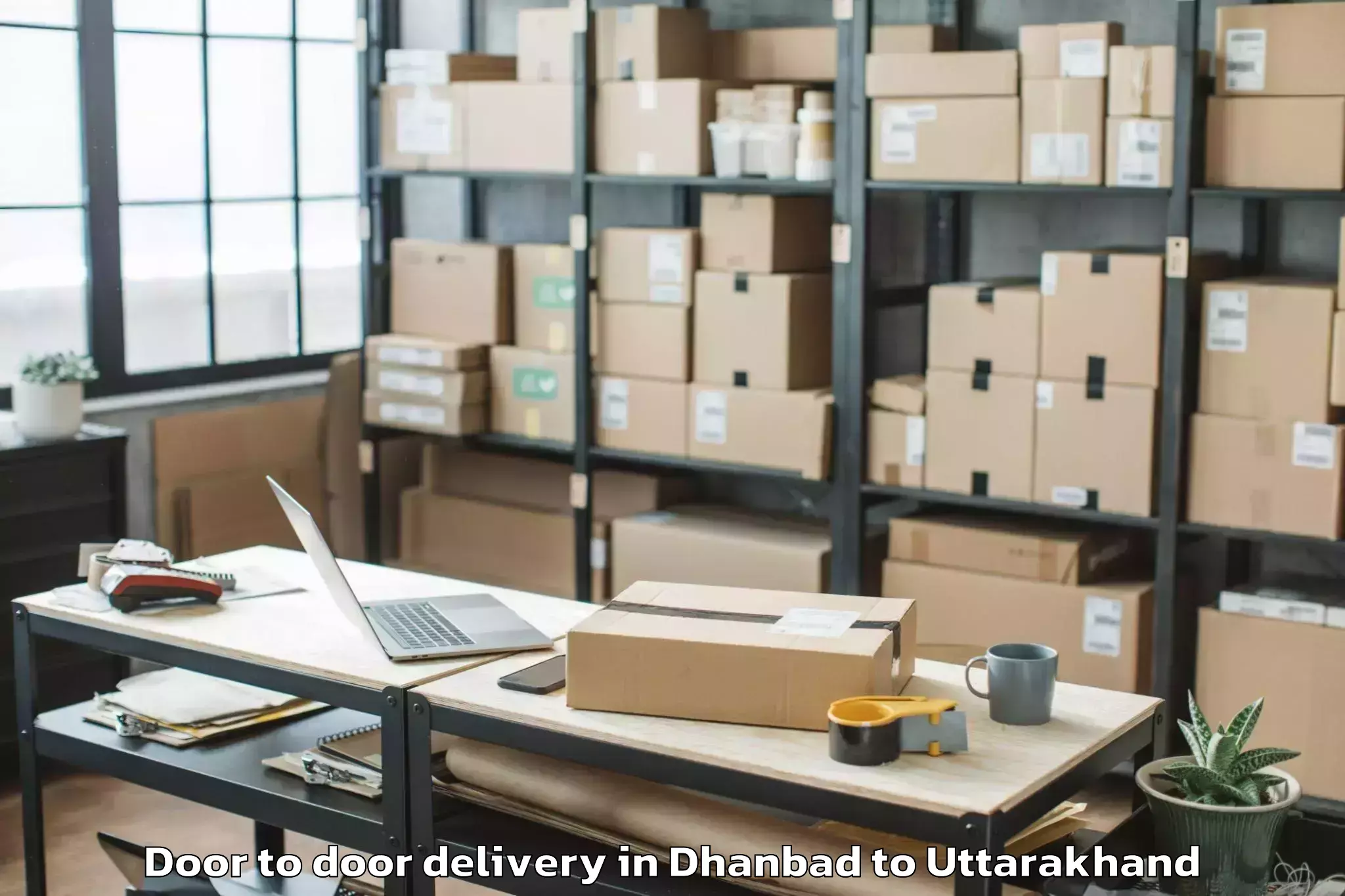 Dhanbad to Lansdowne Door To Door Delivery Booking